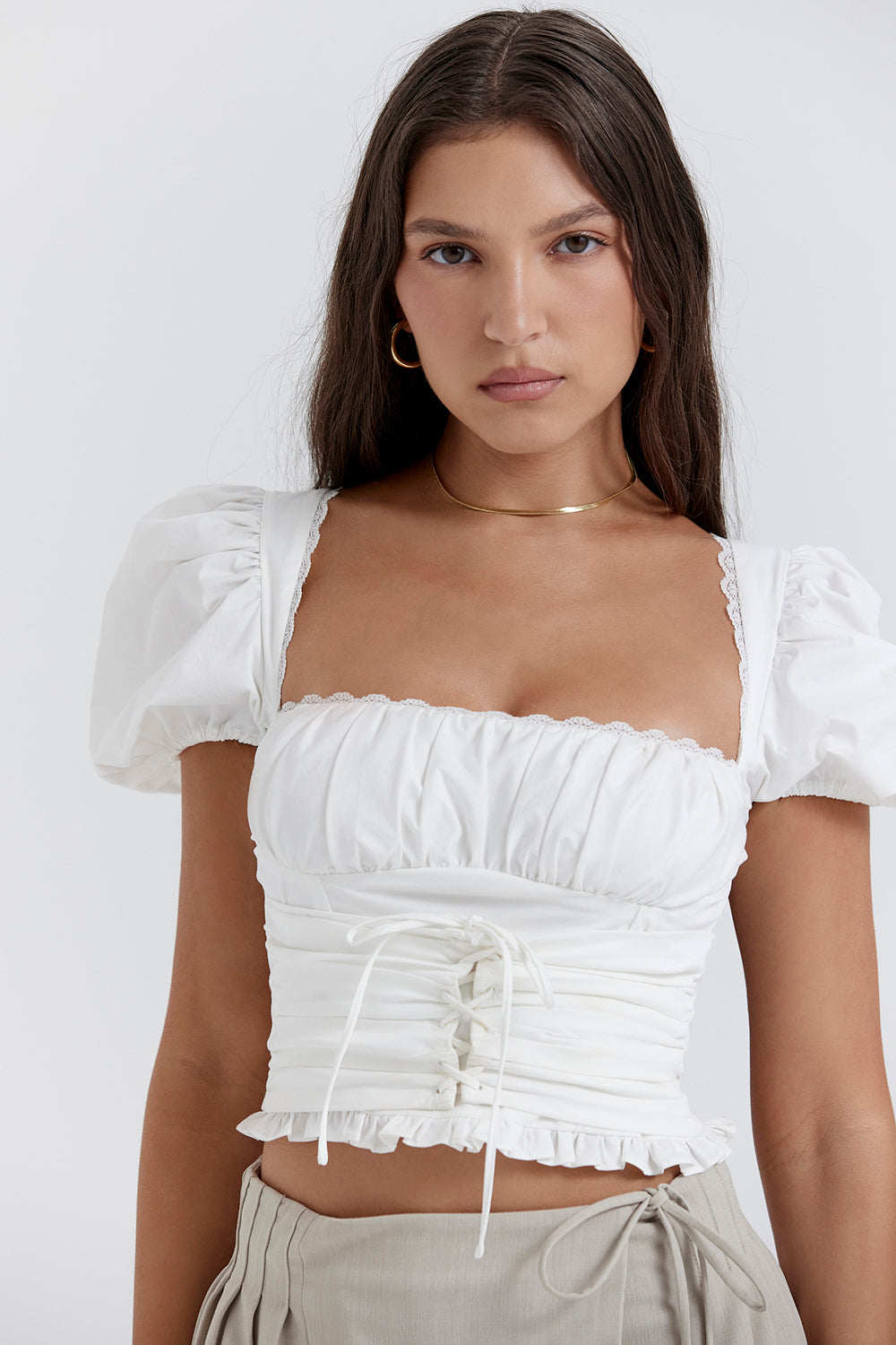 White pleated top with Stone pleated mini wrap skirt