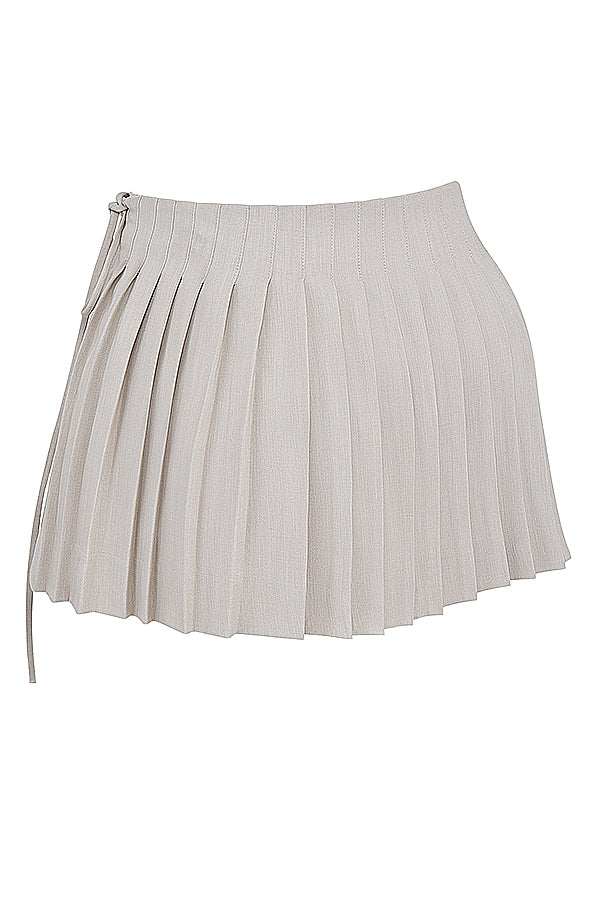 White pleated top with Stone pleated mini wrap skirt