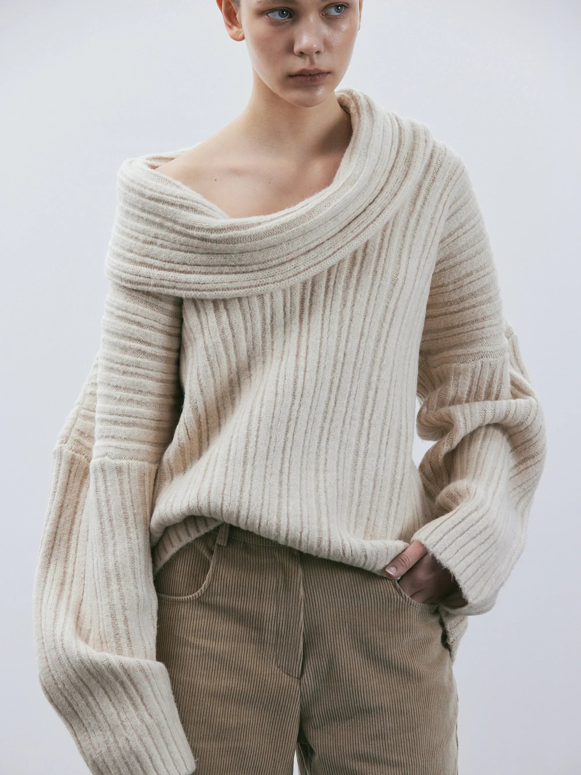 Oversized knitted sweater with high roll