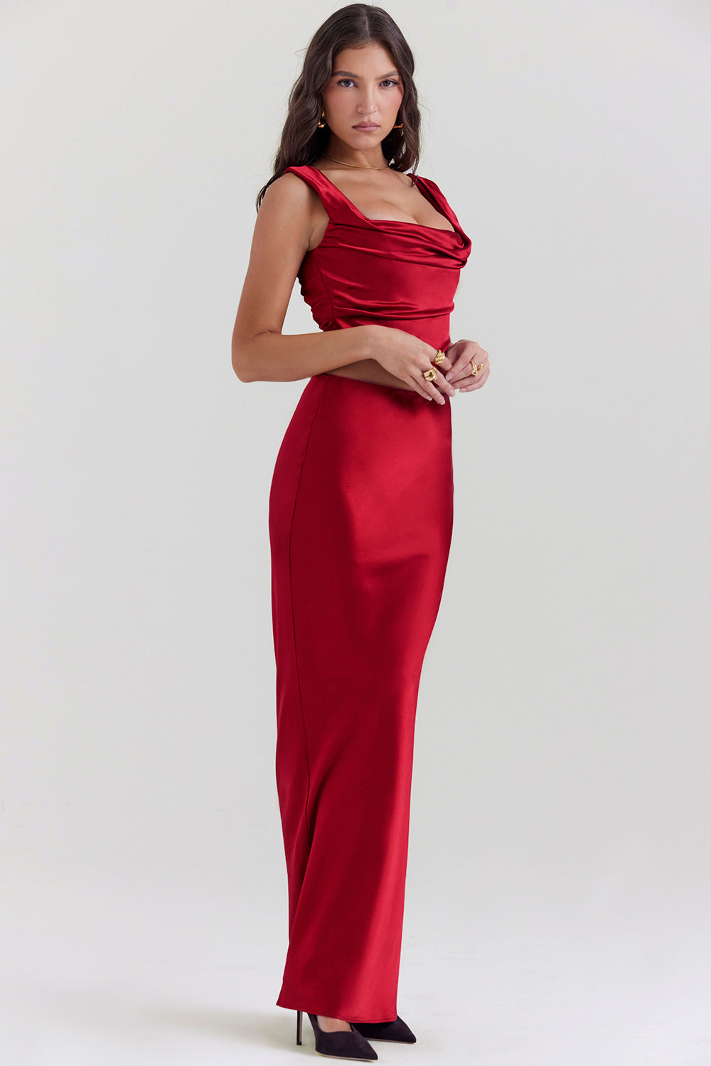 Set of ruby red corset with lace back and diagonally cut satin maxi skirt